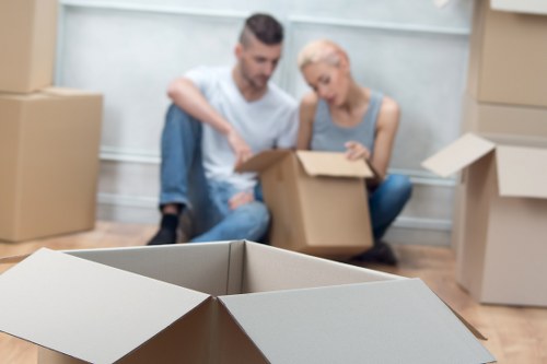 Removal crew unloading items at a Crystal Palace property