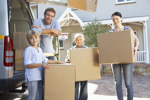 Loading furniture into a moving truck in Crystal Palace
