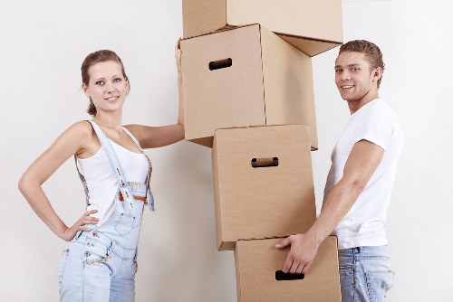 Local movers carefully organising boxes in Crystal Palace