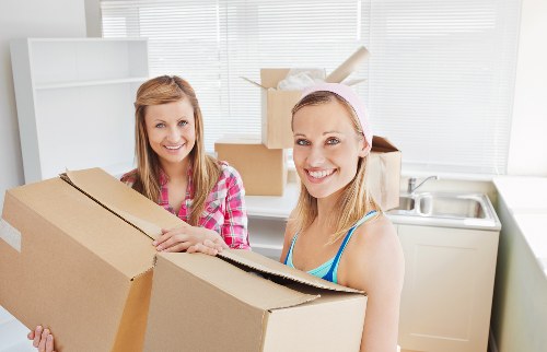 Staff member communicating safety instructions during a move
